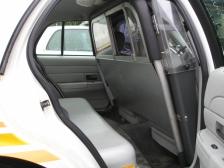 Image result for inside Police cruiser back seat